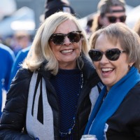 2 women smile at camera